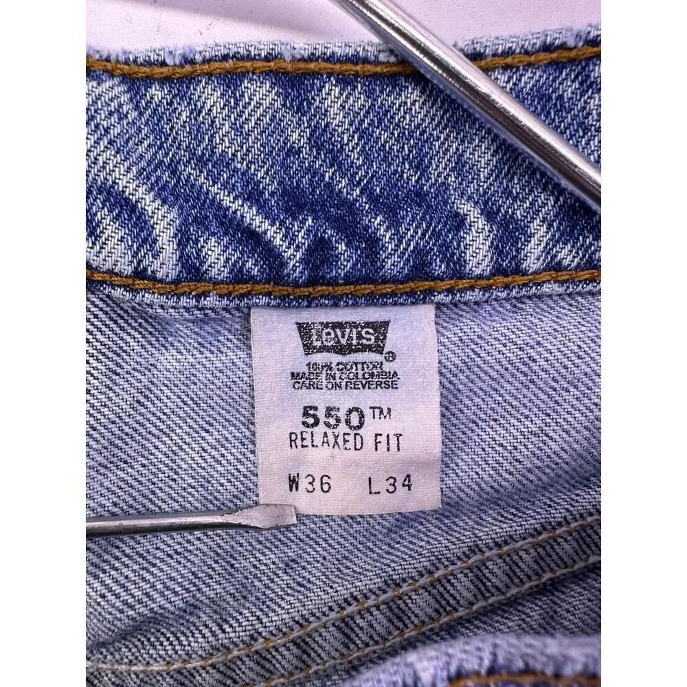 Vint Levi’s 550 Rare Orange Tab Light Blue Jeans Size 36/34